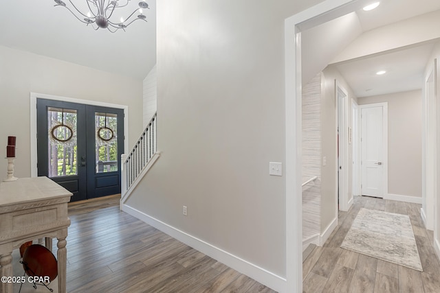 6509 W Sundew Marsh Trl, Panama City Beach, FL 32413 - entryway featuring french doors, wood finished floors, a chandelier, baseboards, and recessed lighting