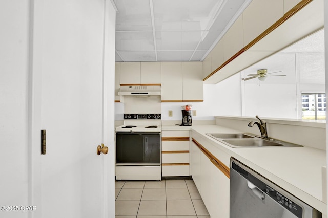 kitchen with white electric stove, light tile patterned floors, ceiling fan, sink, and stainless steel dishwasher