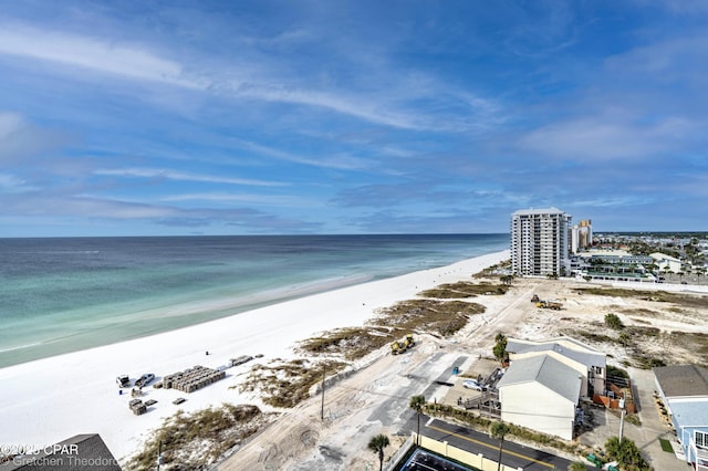 bird's eye view featuring a water view and a view of the beach