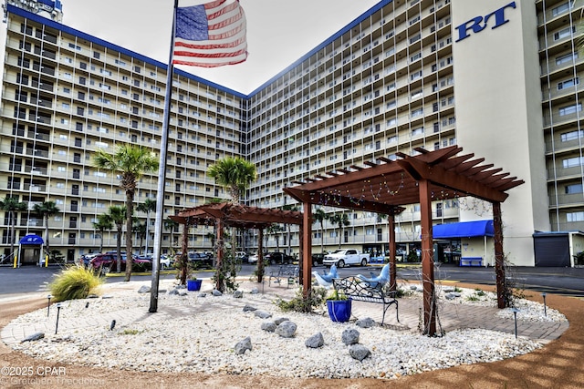 surrounding community with a pergola