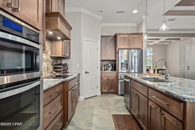 kitchen with sink, backsplash, stainless steel appliances, coffered ceiling, and decorative light fixtures