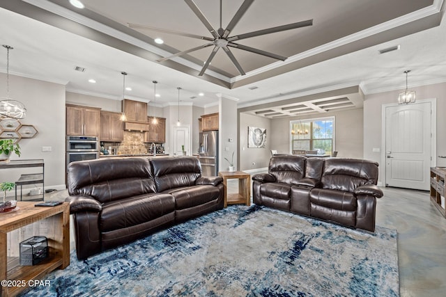 living room featuring crown molding, concrete flooring, and ceiling fan with notable chandelier