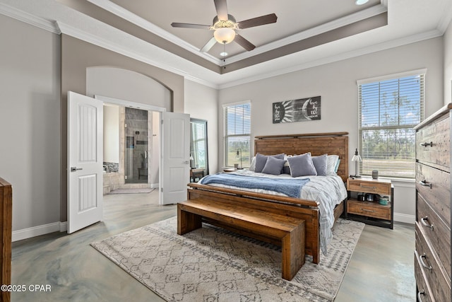 bedroom featuring crown molding, ceiling fan, and a tray ceiling