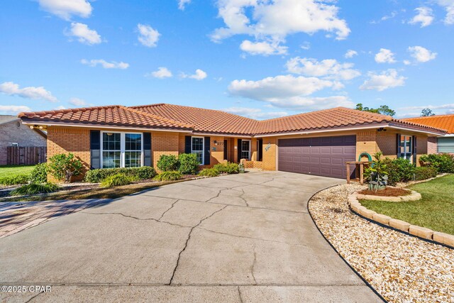 single story home with a garage