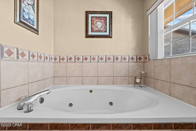 bathroom with tiled bath