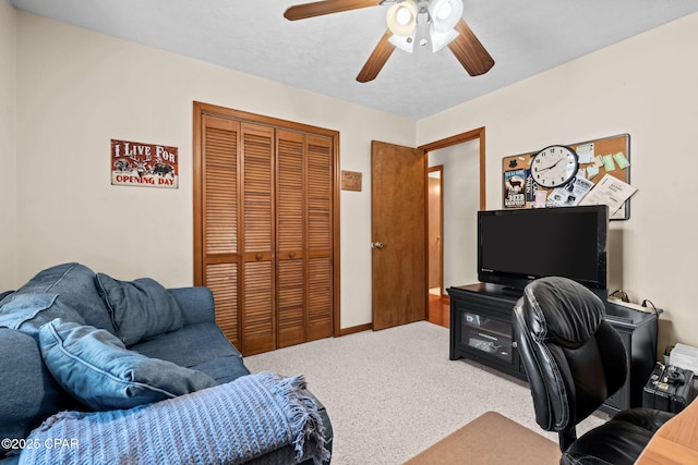 office space featuring carpet floors and ceiling fan