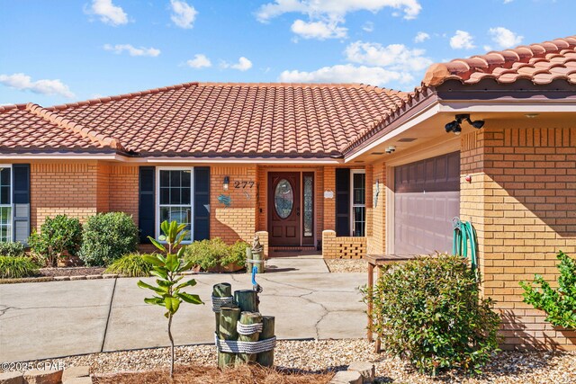 ranch-style home with a garage