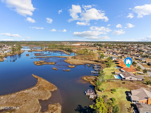 bird's eye view with a water view