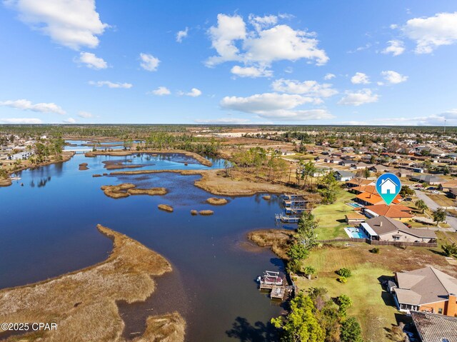 drone / aerial view featuring a water view