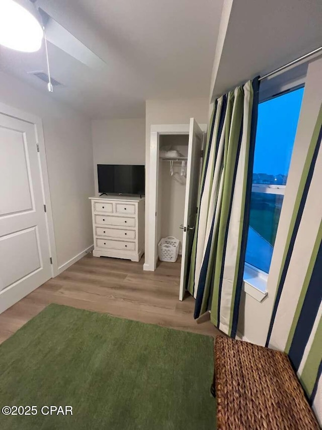 145 Turtle Walk Unit 60, Port St Joe, FL 32456 - unfurnished bedroom featuring wood finished floors, a closet, and ceiling fan