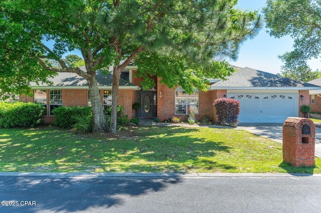 view of front facade with a garage and a front yard