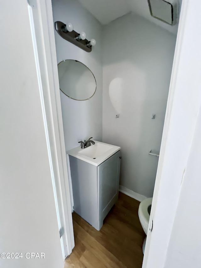 1730 Mallard Dr Apt F, Panama City, FL 32404 - bathroom with wood finished floors and vanity