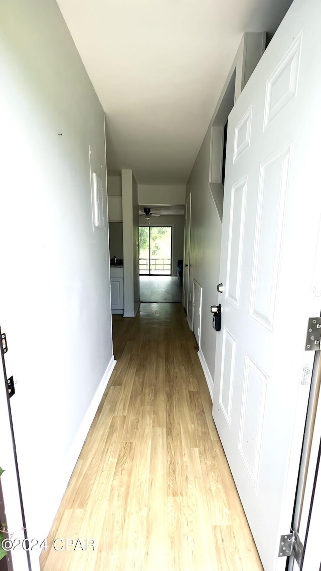 1730 Mallard Dr Apt F, Panama City, FL 32404 - hall featuring baseboards and light wood-style floors