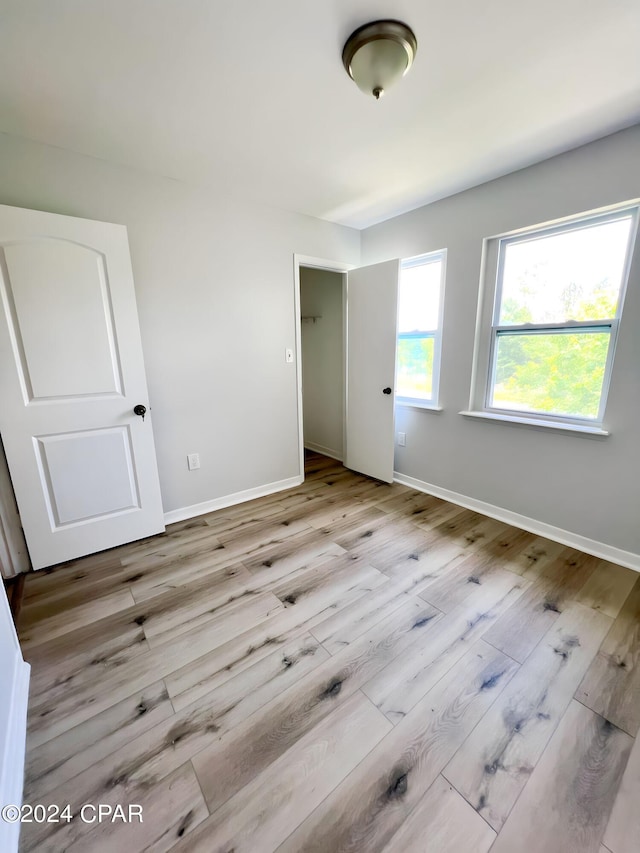 1730 Mallard Dr Apt F, Panama City, FL 32404 - spare room with baseboards and wood finished floors