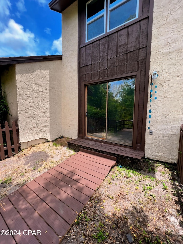 1730 Mallard Dr Apt F, Panama City, FL 32404 - view of exterior entry with stucco siding