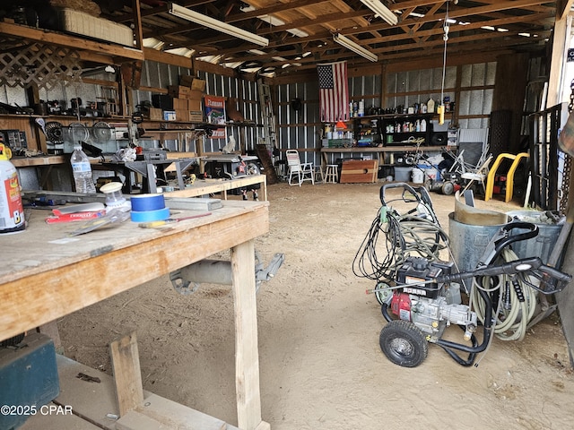 garage with a workshop area