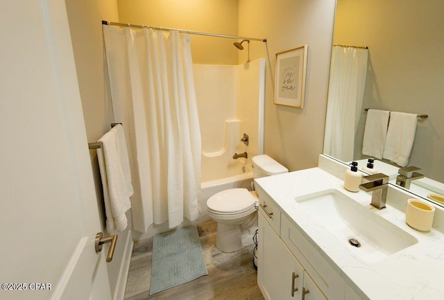 full bathroom featuring wood-type flooring, vanity, toilet, and shower / bath combo