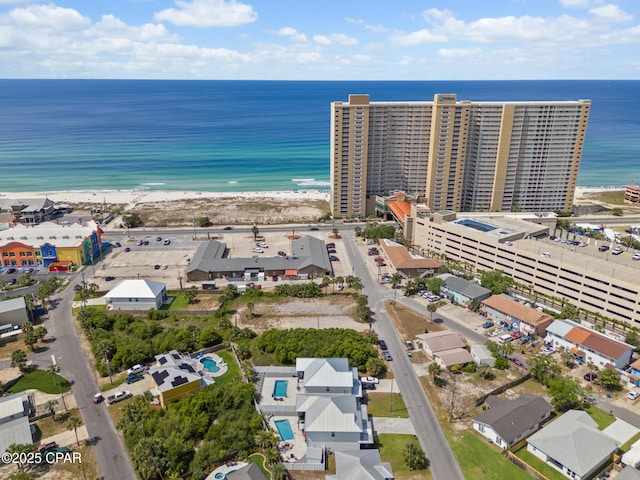 aerial view featuring a water view and a view of the beach