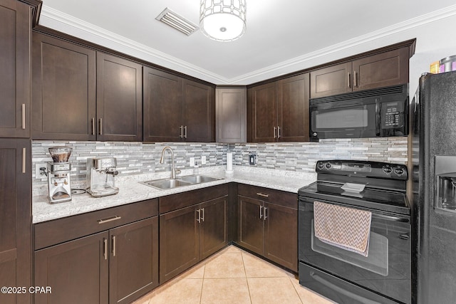 kitchen with visible vents, dark brown cabinets, light tile patterned floors, black appliances, and a sink