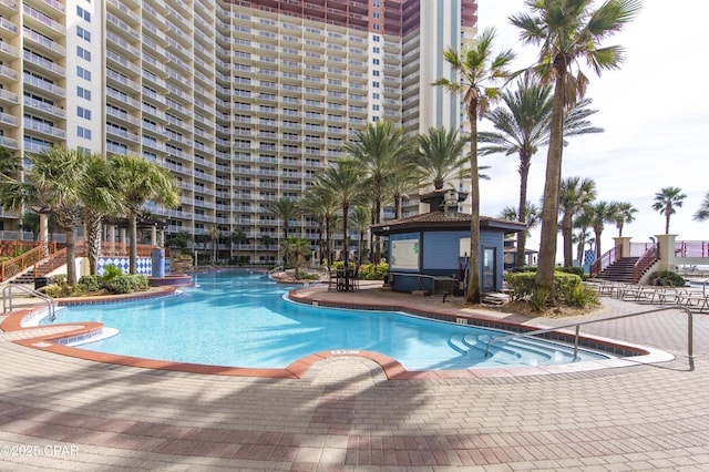 view of pool featuring a patio area