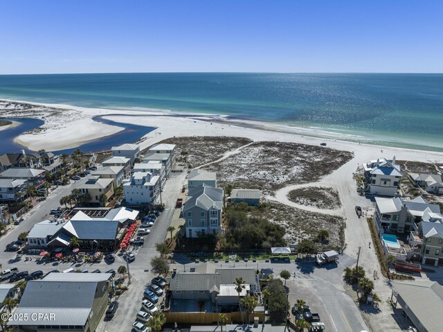 aerial view featuring a water view and a beach view