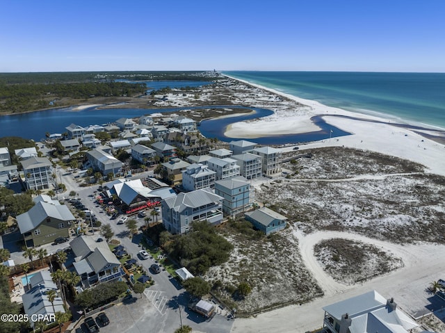 aerial view featuring a water view and a view of the beach