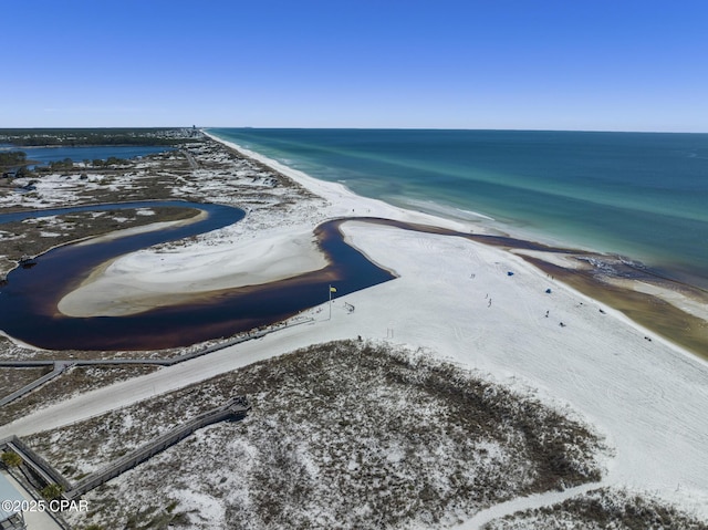 bird's eye view with a water view and a view of the beach