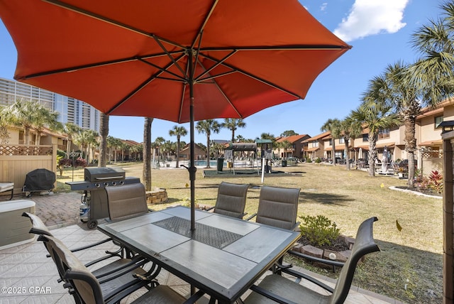 view of patio featuring outdoor dining space and area for grilling