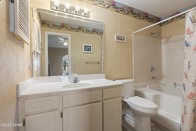 full bathroom featuring shower / bathtub combination with curtain, toilet, ceiling fan, and vanity