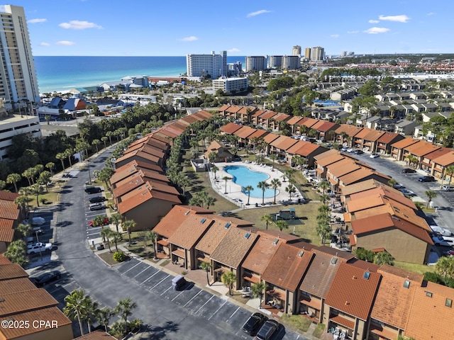 drone / aerial view with a view of city and a water view