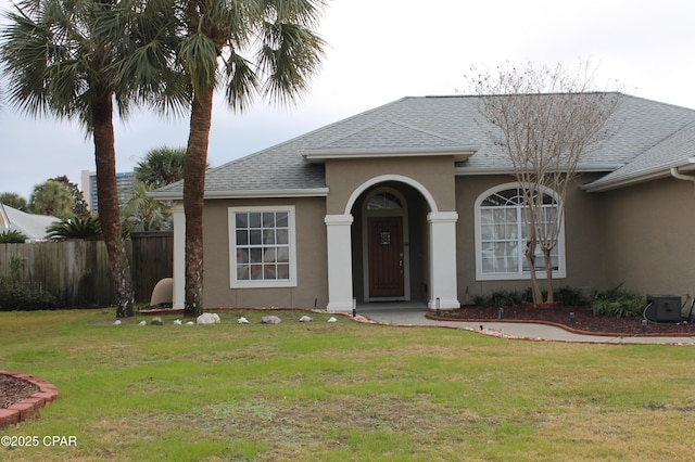 view of front of property with a front lawn