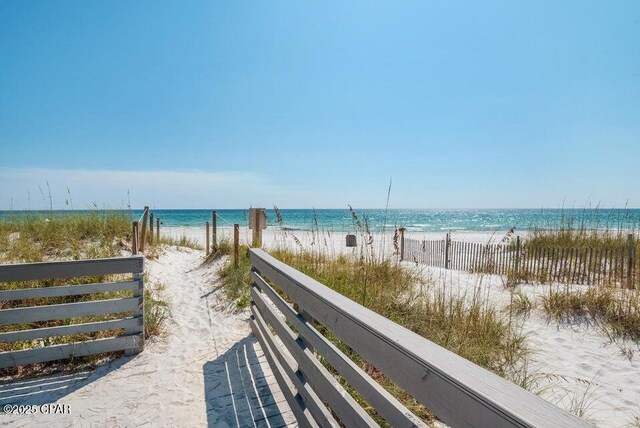 property view of water featuring a view of the beach