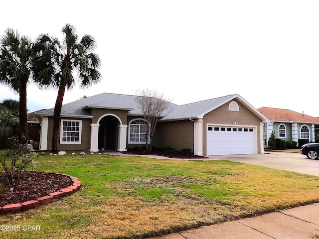 single story home with a front lawn and a garage