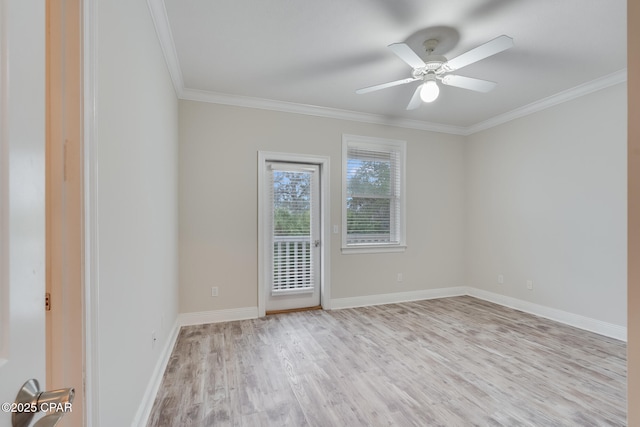 empty room featuring ceiling fan, light hardwood / wood-style floors, and ornamental molding