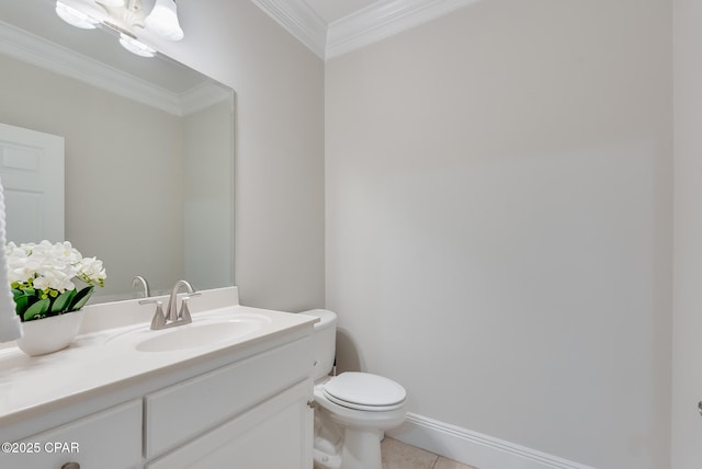 bathroom featuring crown molding, vanity, toilet, and tile patterned flooring