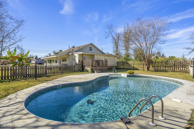 view of swimming pool with a patio