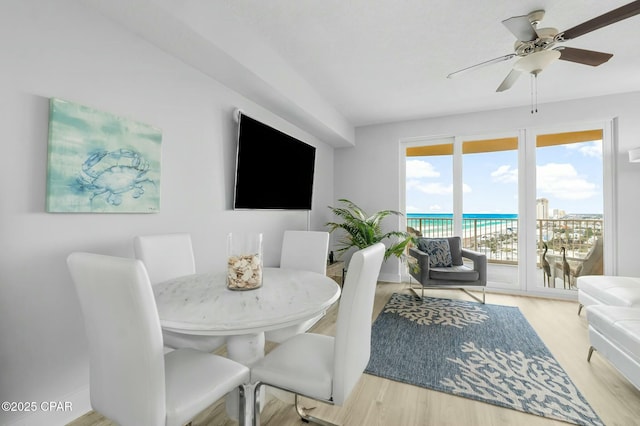 15928 Front Beach Rd Unit 3-1610, Panama City Beach, FL 32413 - dining room featuring wood finished floors and ceiling fan