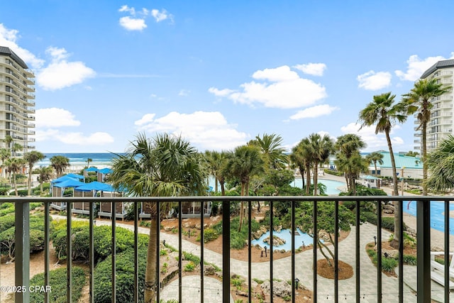 balcony featuring a water view