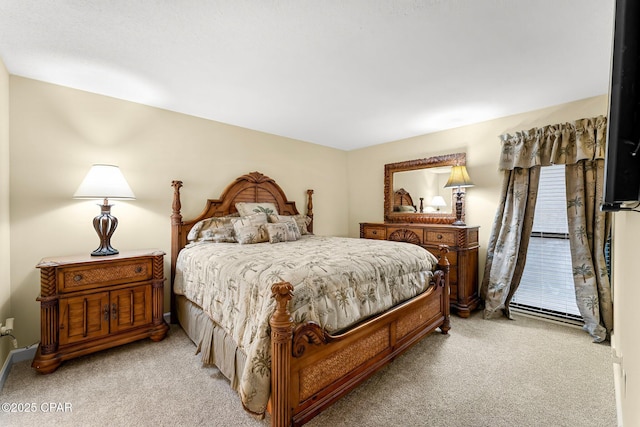 bedroom with light carpet