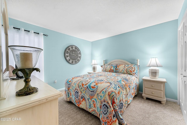 bedroom featuring light colored carpet and a closet