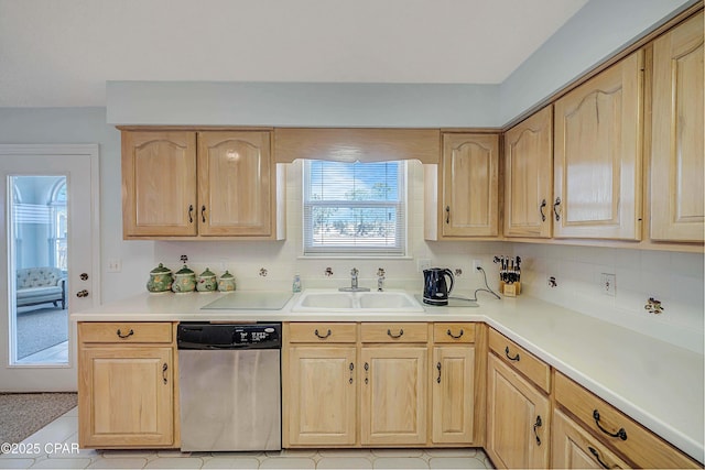 kitchen featuring sink, light tile patterned flooring, light brown cabinetry, decorative backsplash, and stainless steel dishwasher