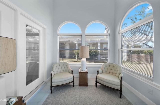 sitting room with light tile patterned flooring