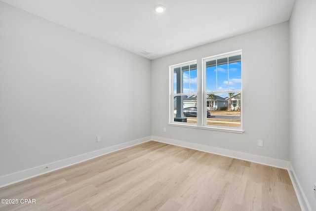 empty room featuring light hardwood / wood-style floors