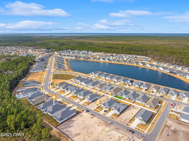 drone / aerial view with a water view