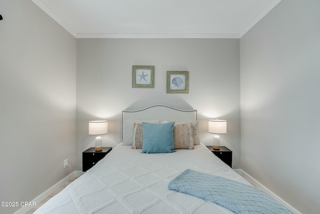 bedroom with ornamental molding