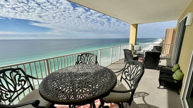 balcony featuring a water view