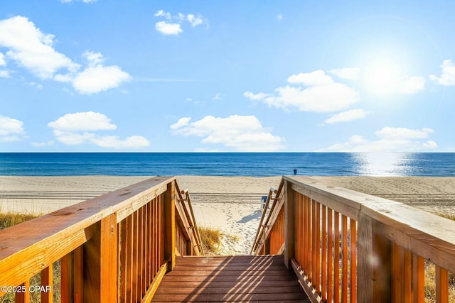 view of community featuring a water view and a view of the beach