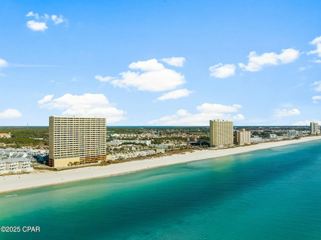 aerial view featuring a water view and a beach view