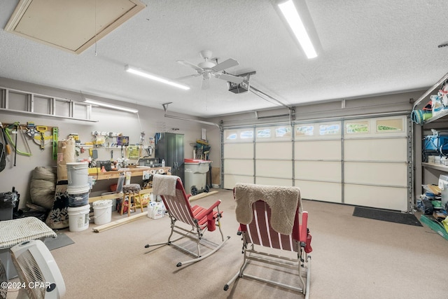 garage featuring a garage door opener and ceiling fan