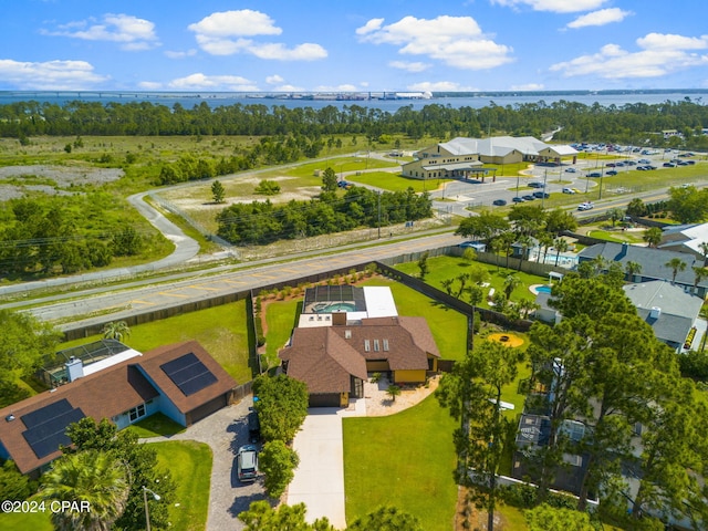 birds eye view of property featuring a water view